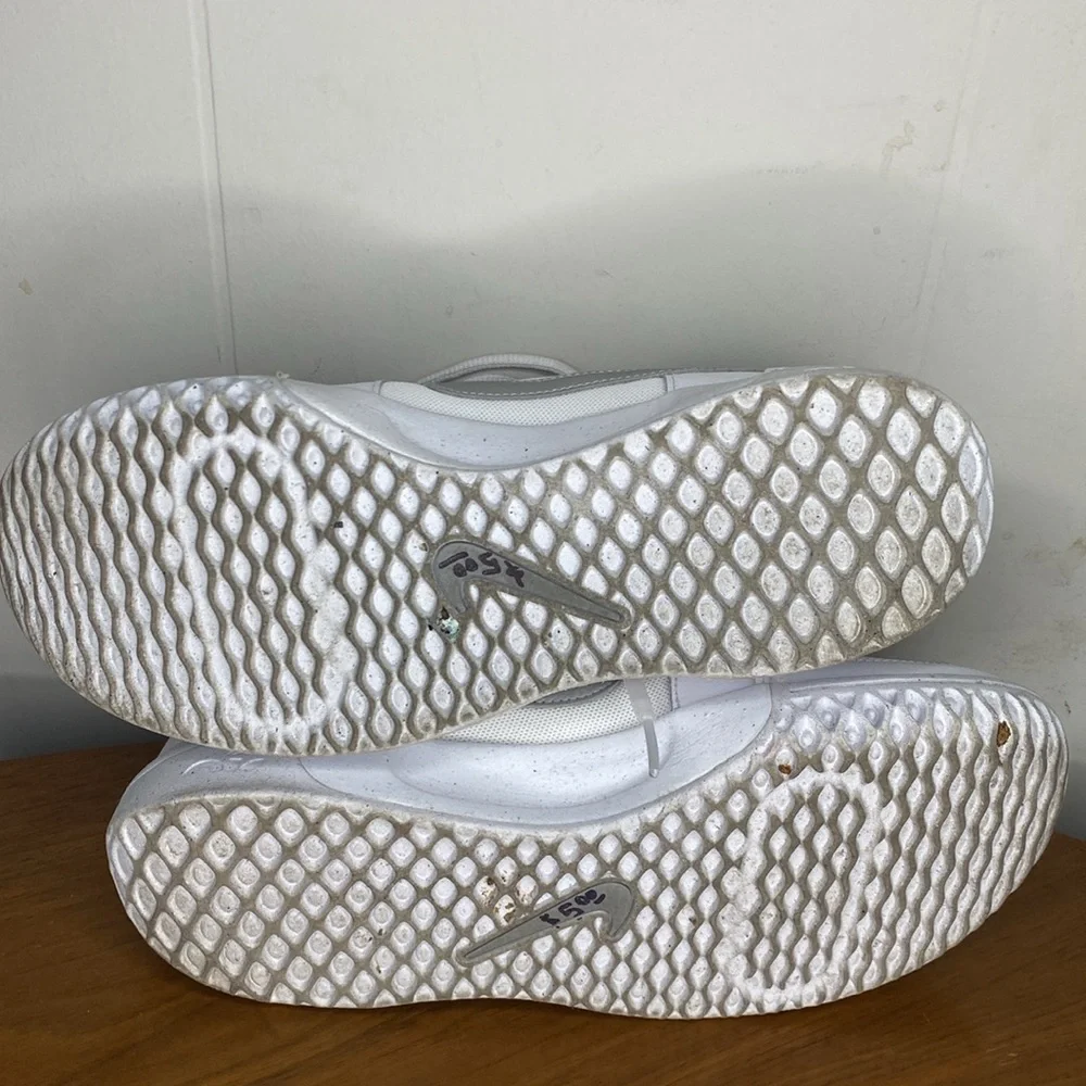 Nike White Sneakers with Silver Swoosh